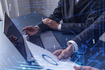 Two information technology specialist brainstorming on project to create a new approach to develop...