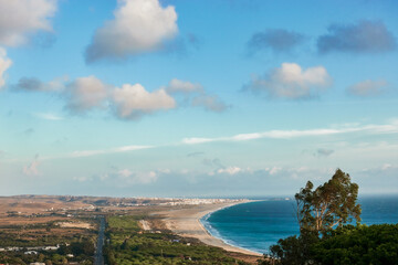 Amazing aerial view of Tarifa coast. Magnificent scene of the long gold sandy Los Lances beach on sunny day