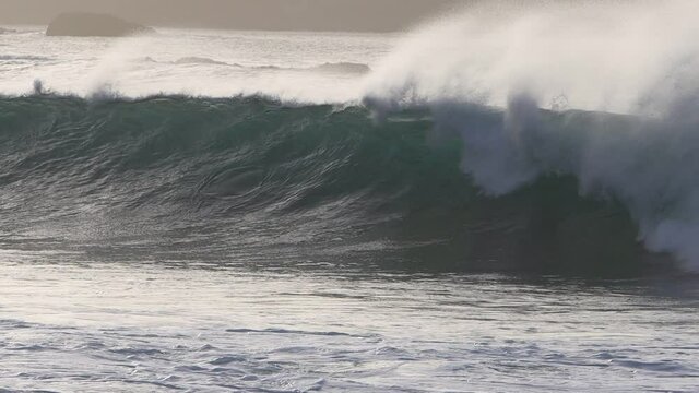 Surfer in Gran Canaria island beach el rincon on back light
