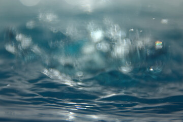 abstract background of flowing water. blurred texture, tidewater green 