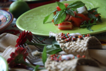 Table decor with flowers and salad