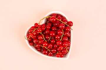 Red currant on white background 