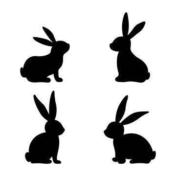 Set of different bunnies silhouettes for design use. Silhouettes of rabbits isolated on a white background.