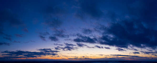 Fototapeta premium Purple paradise sunrise above the clouds, panorama