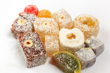 The traditional Turkish dessert Cezerye with hazelnuts. Lokum, Turkish delight.