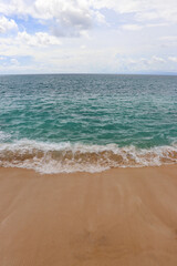 Fototapeta na wymiar Beautiful Beach, crystal clear blue water and white sand at Tegal Wangi Beach Bali Indonesia