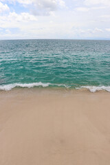 Beautiful Beach, crystal clear blue water and white sand at Tegal Wangi Beach Bali Indonesia