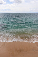 Beautiful Beach, crystal clear blue water and white sand at Tegal Wangi Beach Bali Indonesia