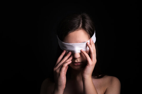 Blindfolded Woman Closeup. Concept Of Censorship, Human Rights, Oppression Or Repression.