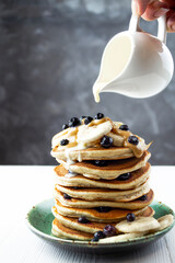 Breakfast concept. Vegan pancakes with vegetable condensed milk.