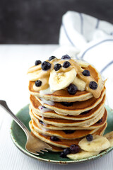 Vegan pancakes with banana and nut butter. The concept of a proper breakfast.