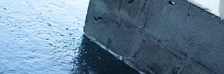 covered with a layer of waterproofing mastic