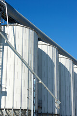 Naklejka premium Metal tanks in a farm