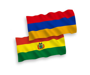 National vector fabric wave flags of Bolivia and Armenia isolated on white background. 1 to 2 proportion.