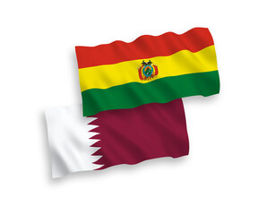 National vector fabric wave flags of Bolivia and Qatar isolated on white background. 1 to 2 proportion.