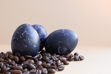 Easter eggs lie in coffee beans
