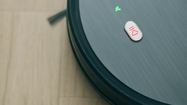 Close up of robotic vacuum cleaner battery indicator showing a battery charge
