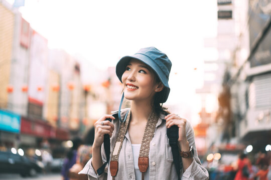 Walking Young Adult Asian Woman Traveller In City Lifestyle At Outdoor At Chinatown Street Food Market Tourism Destination.