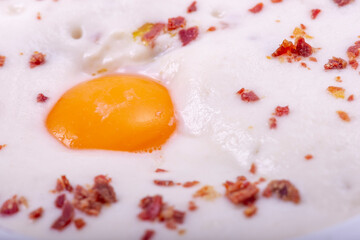 fried eggs with Iberian ham shavings