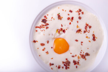 fried eggs with Iberian ham shavings