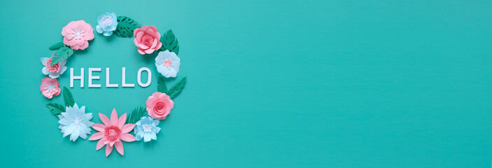 Hello, spring. With pink and blue paper flowers and green leaves