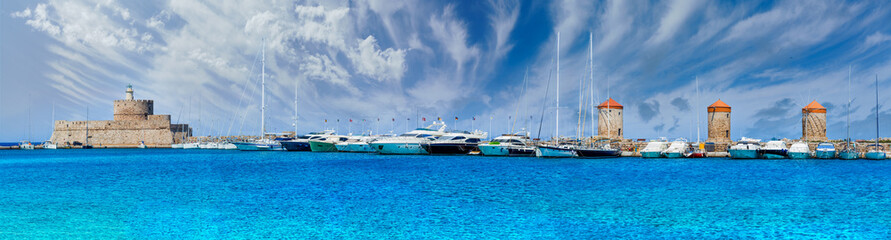 Fototapeta premium Landscape with Mandraki Harbour in Rhodes Island, Greece