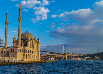 Fototapeta na wymiar The Ortakoy Mosque and the 15th July Martyrs Bridge on the Bosporus in the area of Besiktas, Istanbul, Turkey