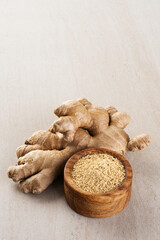 Dried and raw ginger. Spices on a light background.