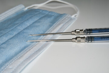 corona masks with vaccination tips