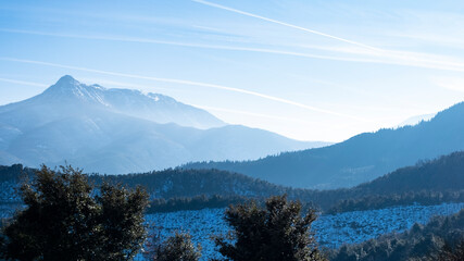 Winter mountain peak landscape on a blue sky in Montseny Catalonia