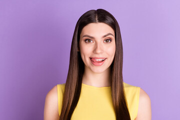 Fototapeta premium Portrait of attractive cheerful funny girl licking lip want tasty dessert isolated over violet purple pastel color background