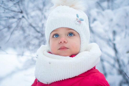 Girl, snow winter, close up, serious