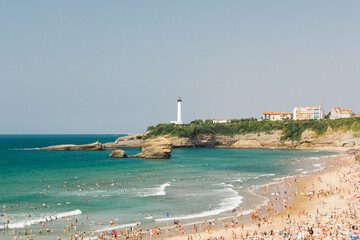 Beach and lighthouse of Biarritz in France - obrazy, fototapety, plakaty