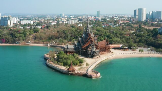 Drone flight over iconic wooden Sanctuary of Truth in Pattaya, Thailand