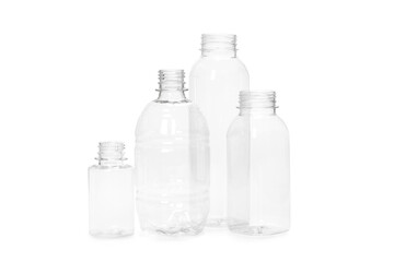 many different empty plastic bottles isolated on white background.