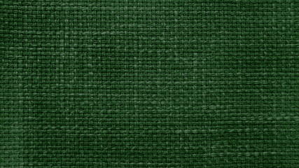 dark green linen texture, burlap fabric as background. close up beige weaving or mesh fabric texture background. close up cotton or fabric fiber background.
