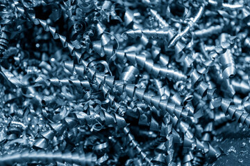 The pile of scrap of lathe machine. The recycle material from metal working process.