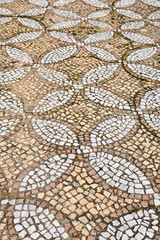 antique mosaic pavement with a pattern of tiles