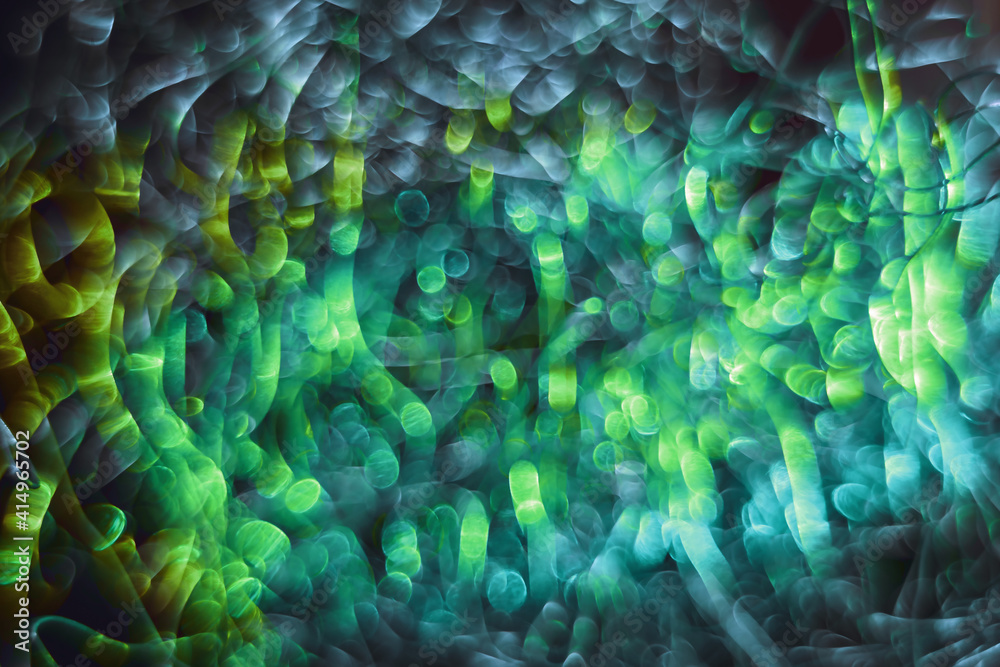 Aufkleber Beautiful optical abstract multicoloured  bokeh in the darkness  background.