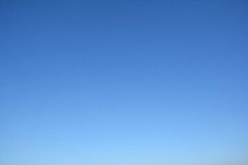 Blue clear sky background, blue color texture with a copy space.