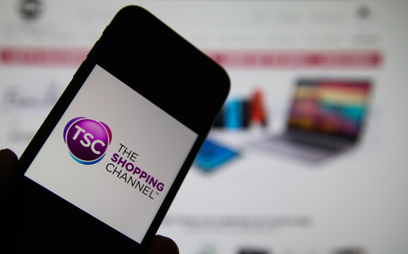 Viersen, Germany - February 9. 2021: Closeup of mobile phone screen with logo lettering of tele shopping channel tsc, blurred website background