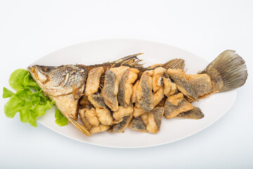 Deep Fried Sea Bass in the white dish on white background