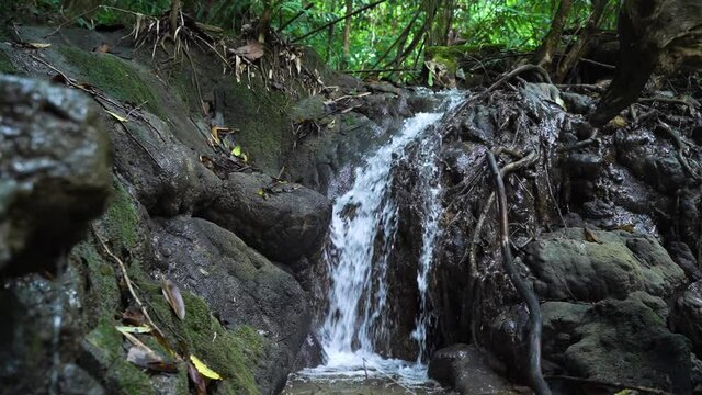 Sa Nang Manora waterfall in Phang Nga, Thailand, wonderful fresh water, small green waterfalls. Looks comfortable.