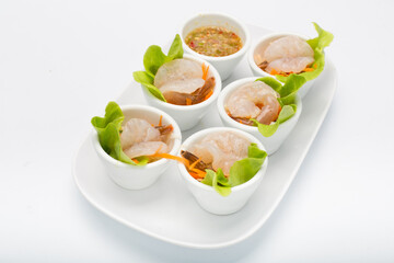Spicy salad Shrimp in fish sauce and herb and Spicy Sauce Seafood dipping chili hot and spicy dish on White Background