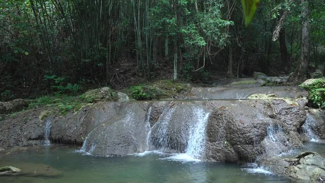 Sa Nang Manora waterfall in Phang Nga, Thailand, wonderful fresh water, small green waterfalls. Looks comfortable.