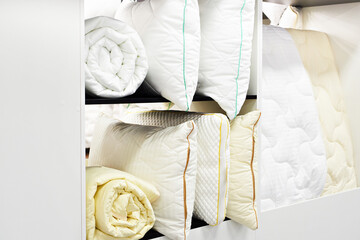Fototapeta na wymiar Assortment of pillows and blankets for sleeping