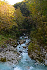 A bridge over the Zadlascica River near its confluence with Tolminka River in Tolmin Gorge, Triglav National Park, western Slovenia
