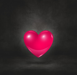 3D pink heart on a black studio background