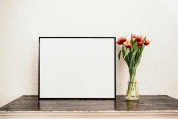 Blank picture frame in spring