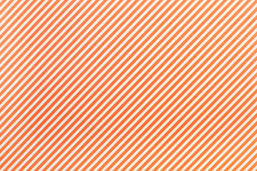 Textura y fondo a rayas naranjas y blancas. Vista superior y de cerca. Copy space